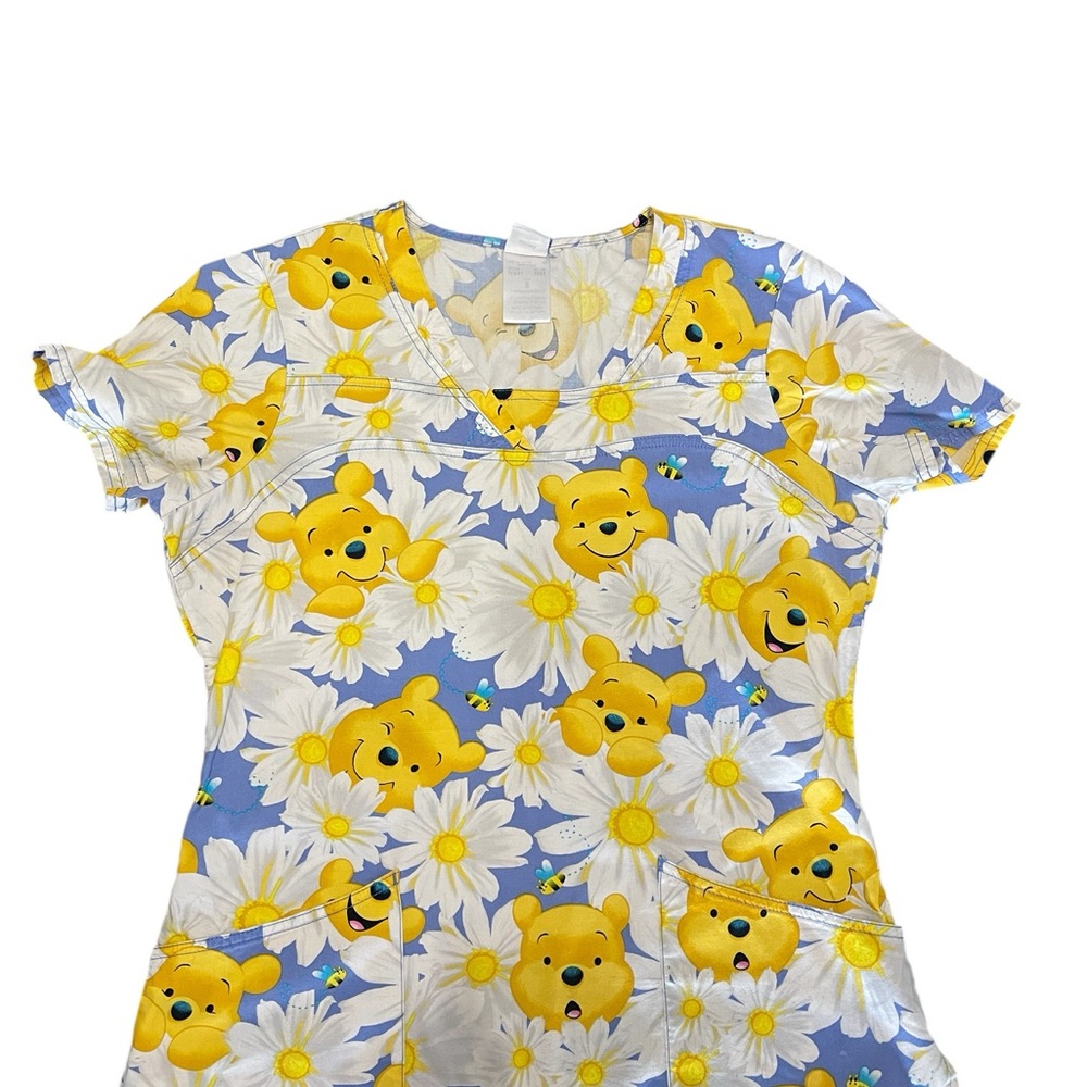 Disney Blue and Yellow Floral Print Adult Woman’s Scrub.
Size S